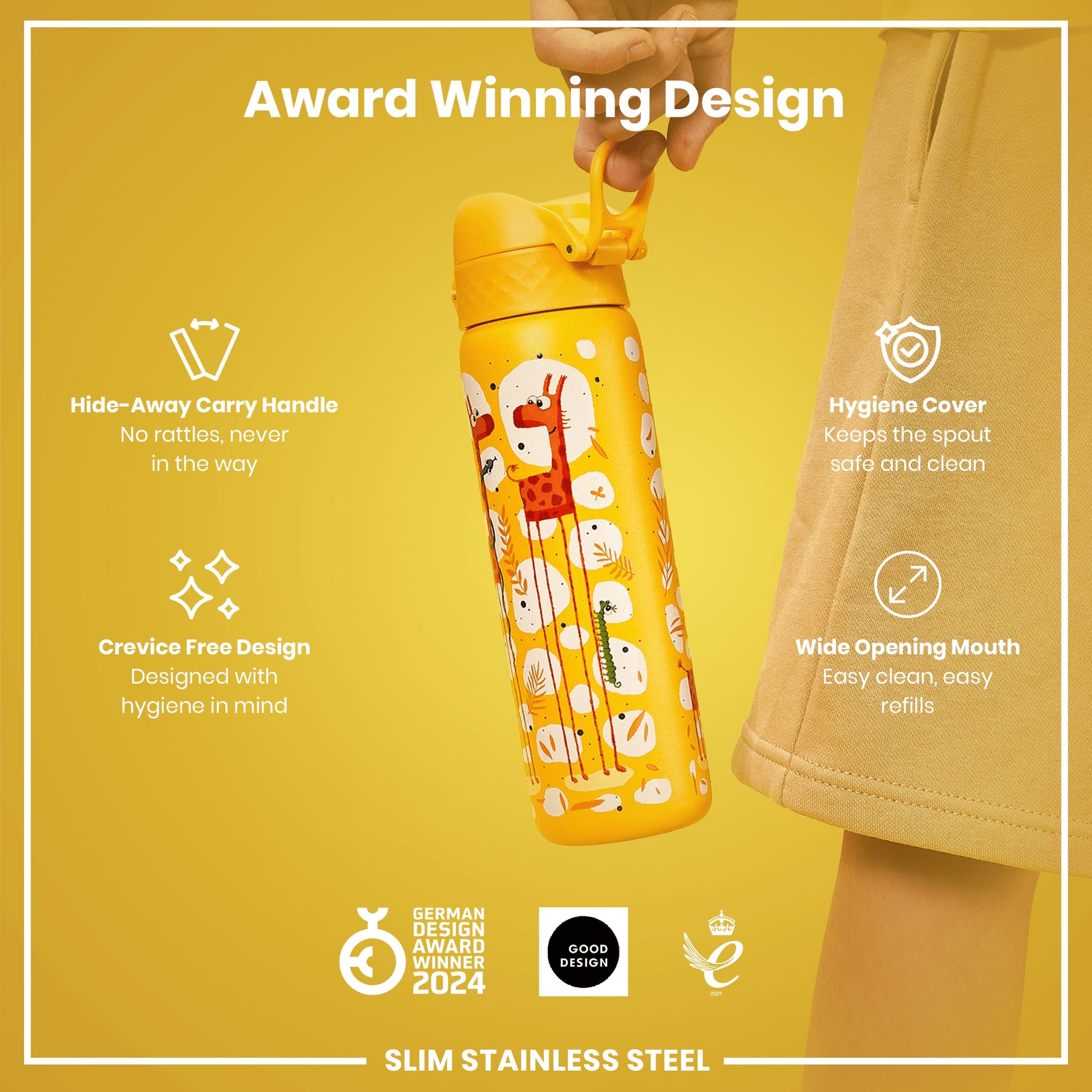 A yellow, giraffe-patterned water bottle is being held; it features a hide-away handle, hygiene cover, and wide mouth. The bottle is an award-winning design, made of slim stainless steel.