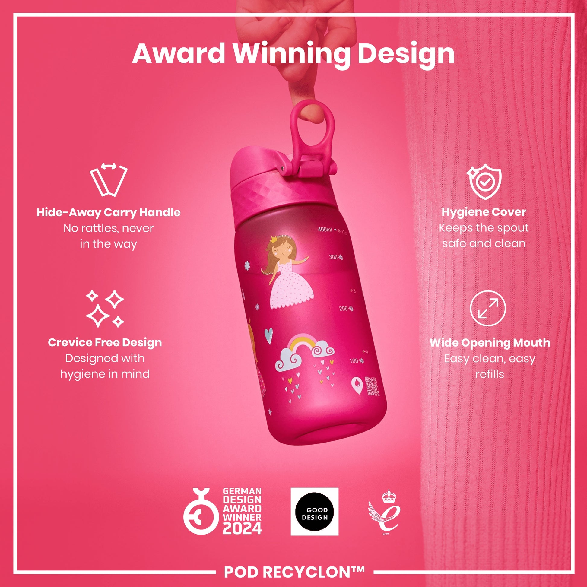 A pink children's water bottle is being held; it features a hide-away handle, a crevice-free design, and a wide mouth. The bottle's design is award-winning.