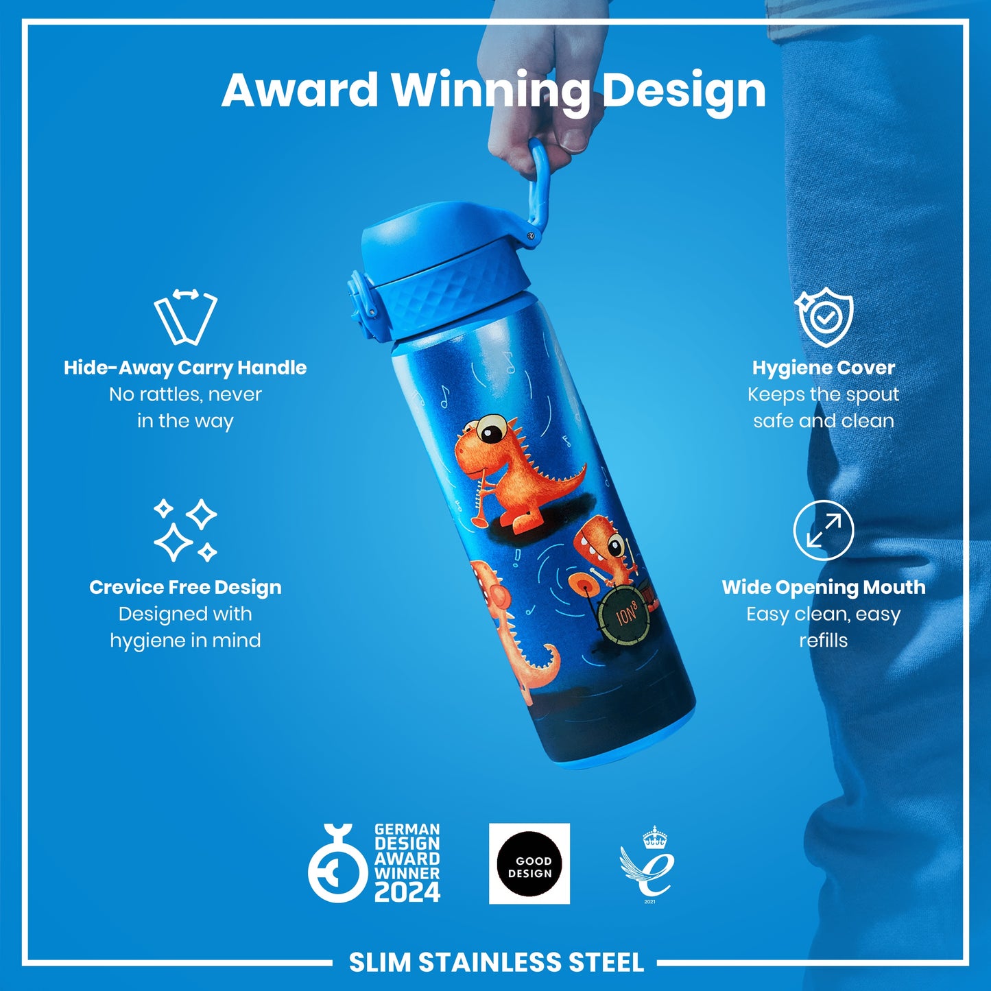A blue water bottle, with a dinosaur design, is being held. Its features include a hide-away handle, crevice-free design, hygiene cover, and wide mouth. It’s an award-winning, slim stainless steel bottle.