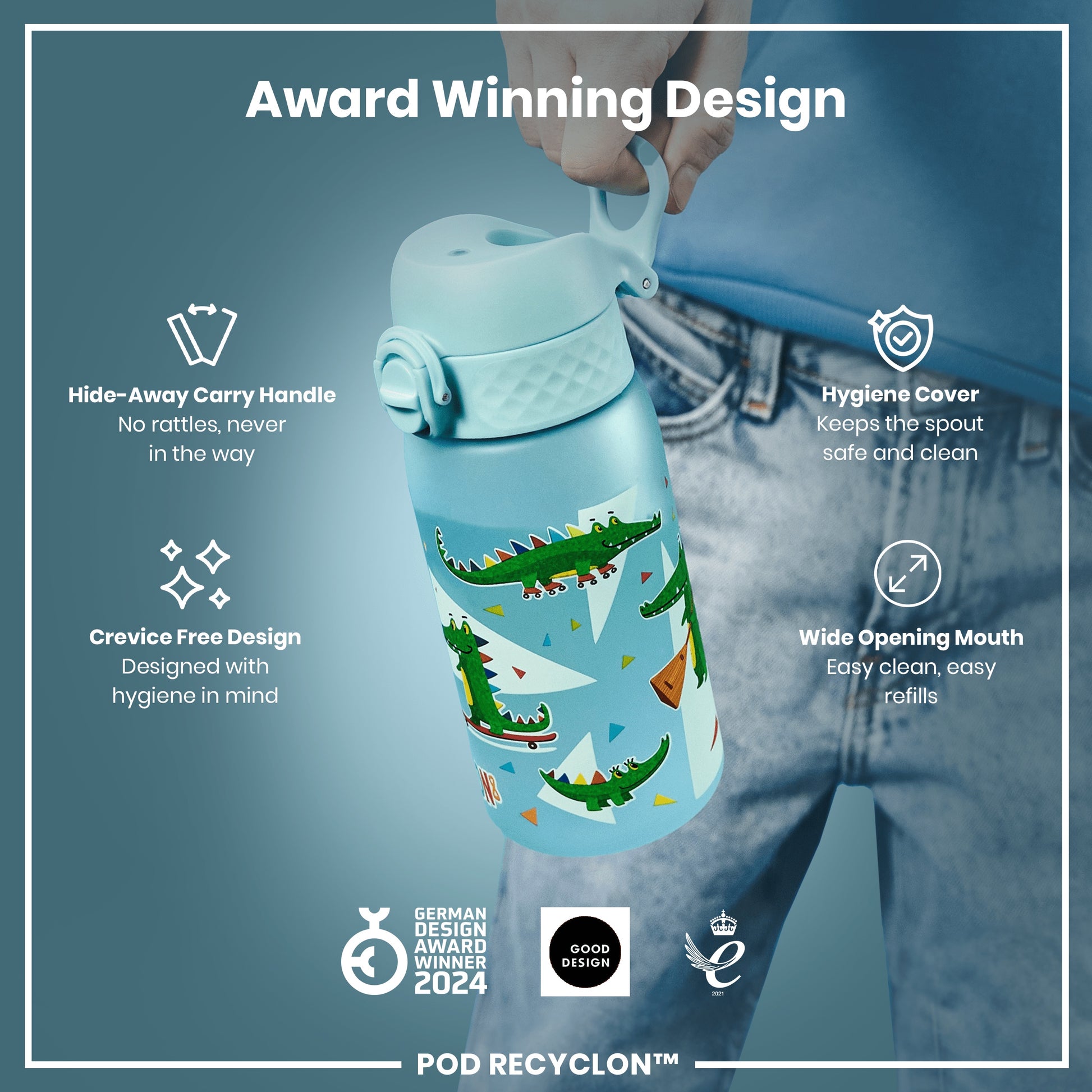 A light-blue children's water bottle, featuring cartoon crocodiles, is being held. Its design includes a hide-away handle, hygiene cover, and wide mouth for easy cleaning and refilling. The bottle is an award-winning design.
