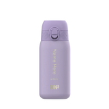 A lavender ION8 water bottle stands upright. It features a flip-top lid and text reading 