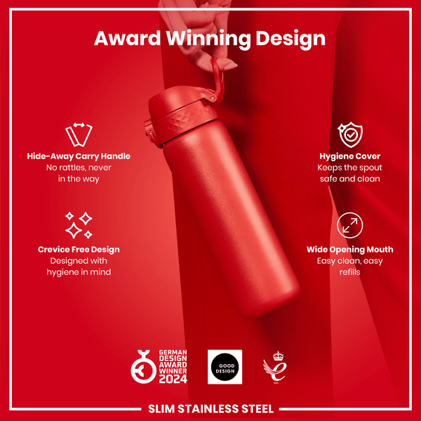 A red, slim stainless steel water bottle is being held; its features, including a hide-away handle, crevice-free design, hygiene cover, and wide mouth, are highlighted against a red background. The bottle is an award-winning design.