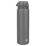A dark gray water bottle stands upright against a white background. The bottle has a screw-on lid with a carrying loop. The brand 