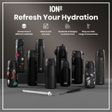 Several black water bottles, various sizes and designs, are displayed on a gray surface; accessories are also shown. 
