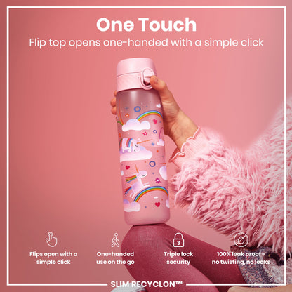 A pink unicorn-decorated water bottle is held; its flip top opens one-handed. The bottle features a triple lock security mechanism and is 100% leak-proof; the context is a pink background. The bottle is described as "SLIM RECYCLON™".