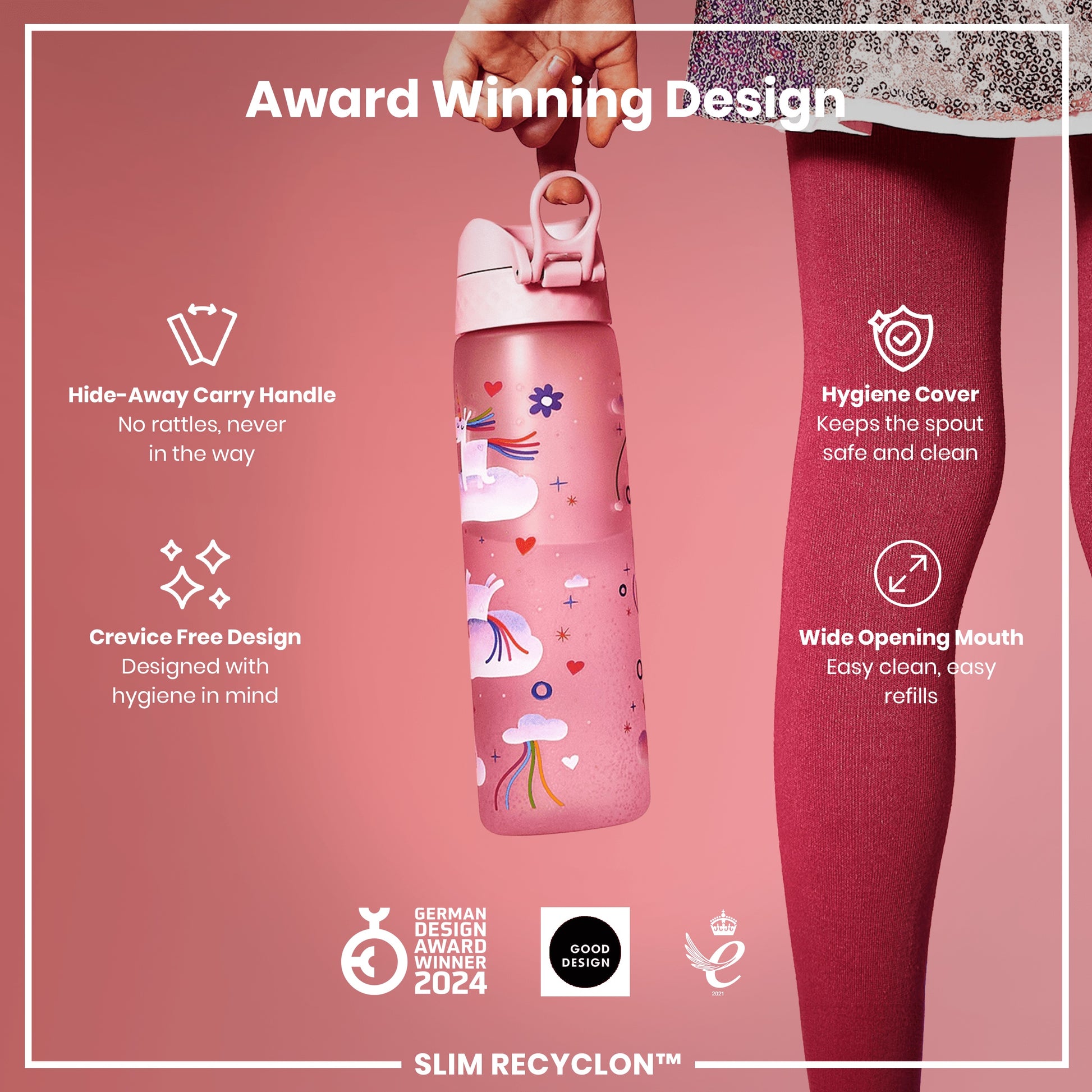 A pink water bottle with a unicorn design is being held. It features a hide-away handle, crevice-free design, hygiene cover, and wide mouth. Awards include German Design Award Winner 2024 and Good Design.