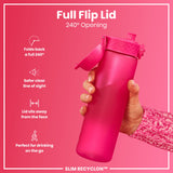 A pink water bottle with a flip lid is being held; its lid is open to 240 degrees against a pink background. Full Flip Lid, 240° Opening, SLIM RECYCLON™.