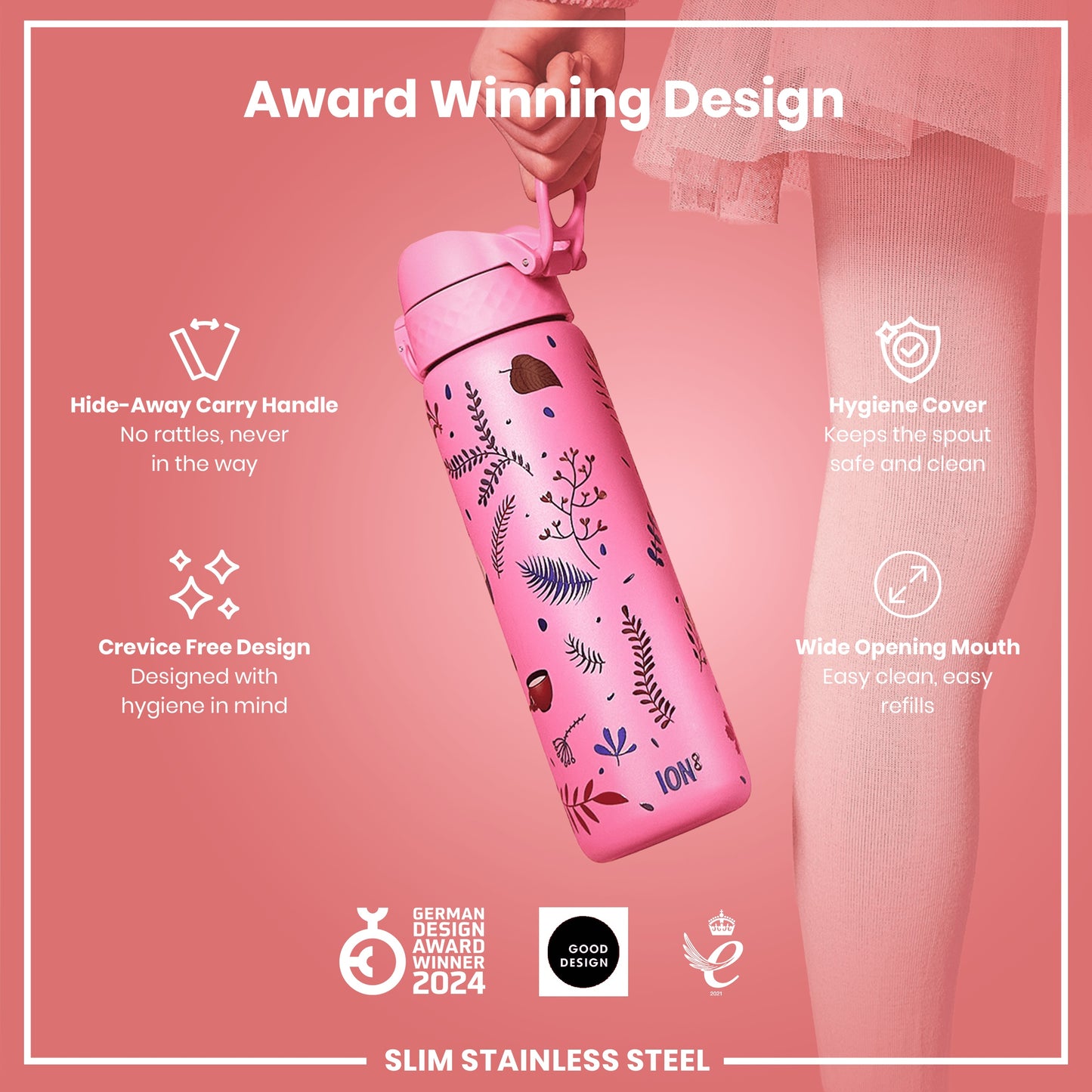 A pink water bottle with floral print is being held; it features a hide-away handle, hygiene cover, and wide mouth opening. The bottle is an award-winning design, made of slim stainless steel.