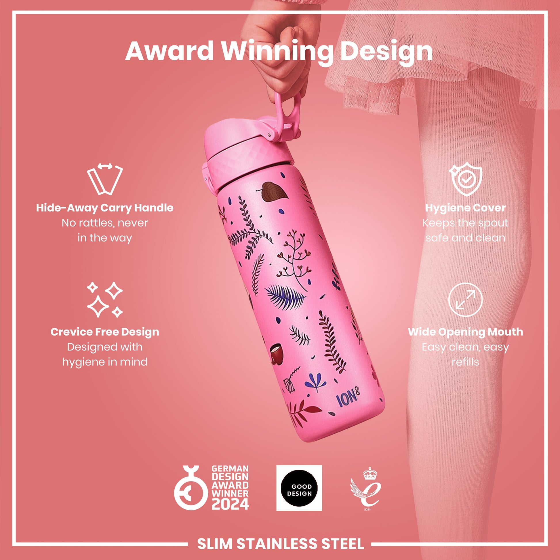 A pink water bottle with floral print is being held; it features a hide-away handle, hygiene cover, and wide mouth opening. The bottle is an award-winning design, made of slim stainless steel.