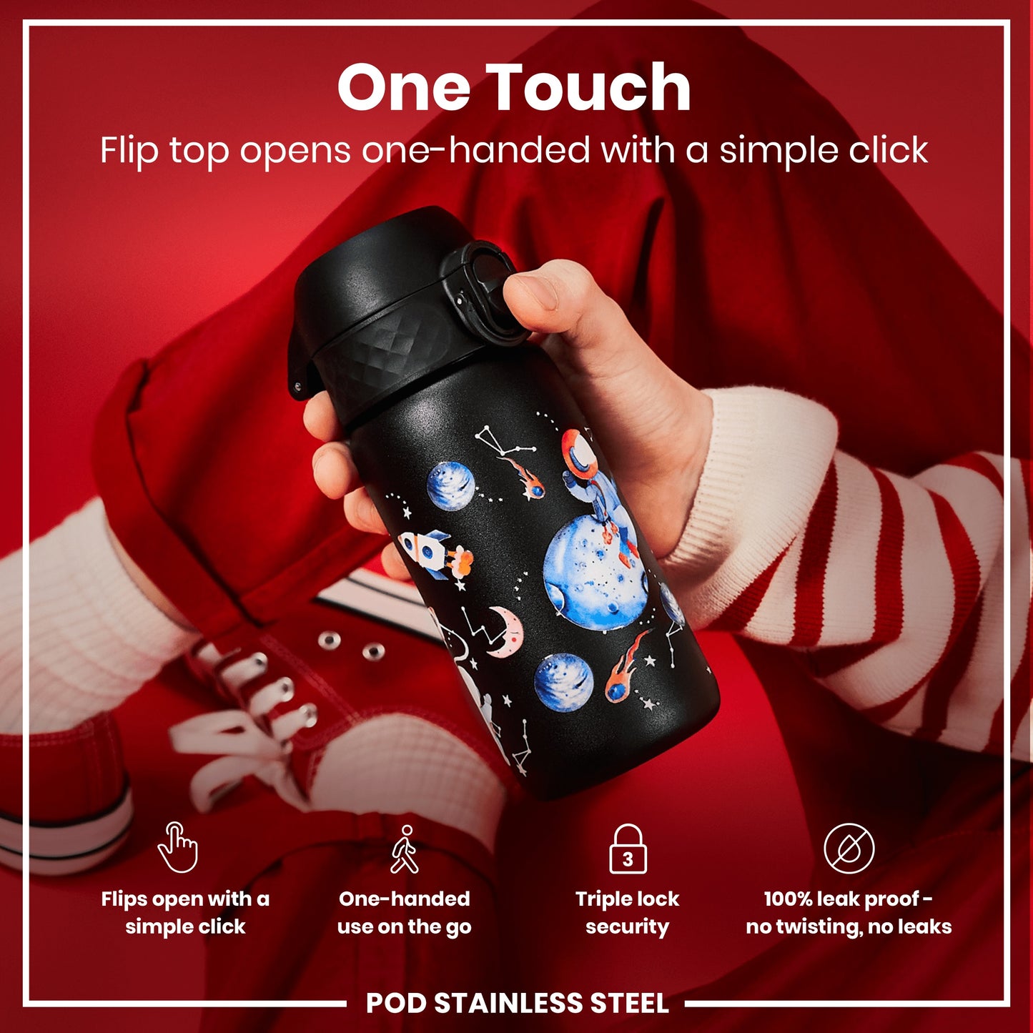 A black, space-themed water bottle with a flip top is being held. The flip top opens one-handed with a simple click. The bottle is shown against a red background.