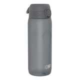 A dark gray water bottle sits on a white background. The bottle has a dark gray cap with a small loop handle and the word 