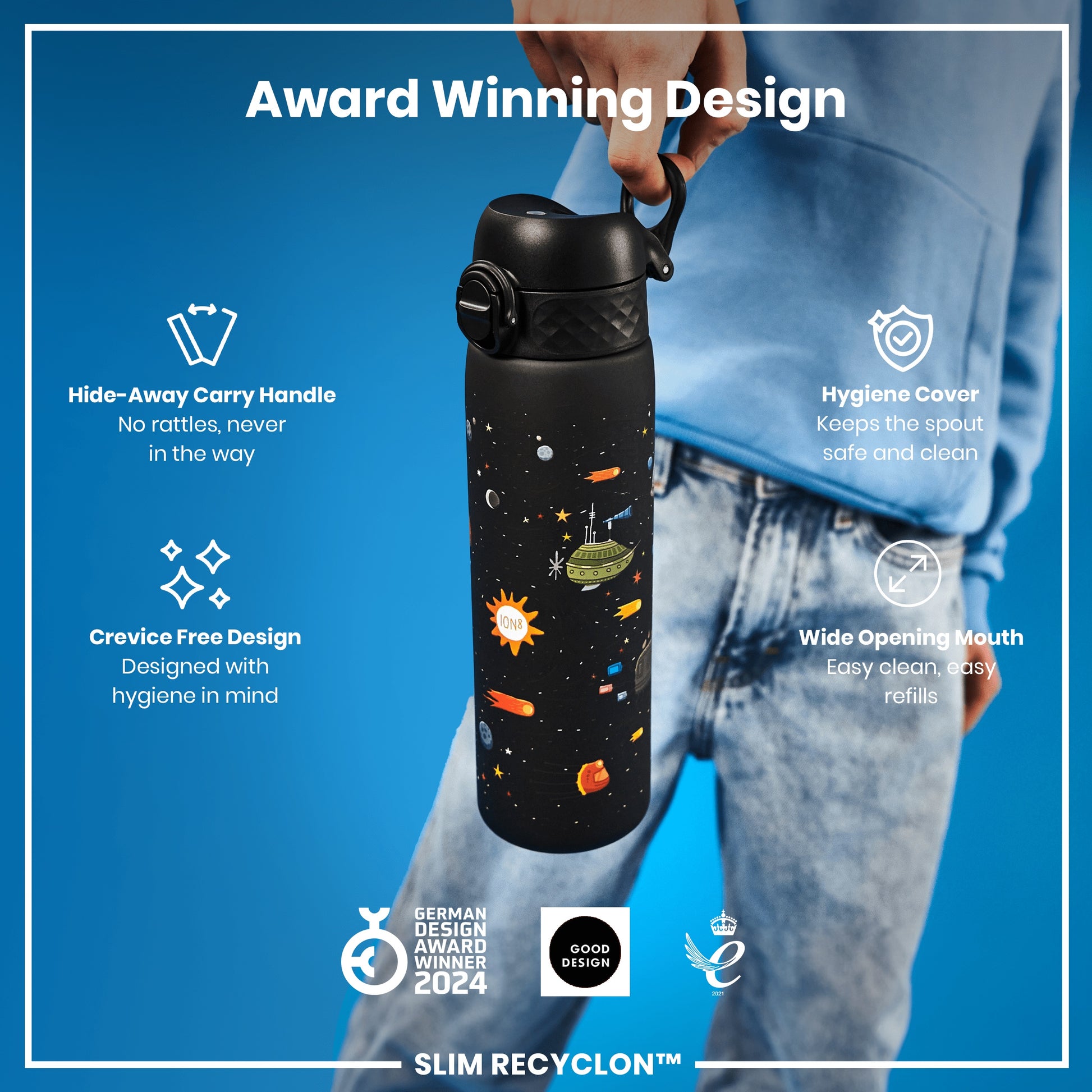 A water bottle, being held, shows off its features against a blue backdrop. Award Winning Design. Hide-Away Carry Handle. No rattles, never in the way. Hygiene Cover. Keeps the spout safe and clean. Crevice Free Design. Designed with hygiene in mind. Wide Opening Mouth. Easy clean, easy refills. GERMAN DESIGN AWARD WINNER 2024. GOOD DESIGN. SLIM RECYCLON™. 2021.