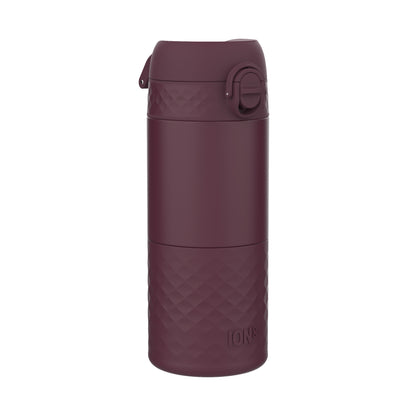 A dark-burgundy ION8 water bottle sits upright against a white background. The bottle features a textured, diamond-patterned base and a hinged, snap-on lid.