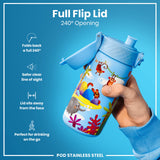 A blue stainless steel water bottle, with a 240° opening flip lid, is being held; against a light blue background. The bottle features a jungle animal design. 
