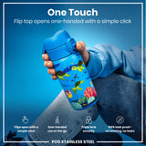 A blue water bottle, decorated with sea turtles, is held; its flip top opens one-handed. The background is a solid blue. 