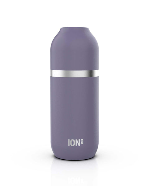 A cylindrical purple water bottle with a metallic band around the middle stands upright against a white background featuring the text ION8 near its base.