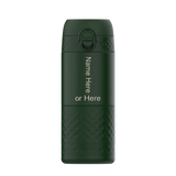 A dark green insulated bottle stands with a textured lower half. The text reads 