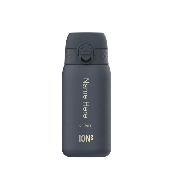 A dark gray water bottle stands upright featuring a flip-top lid and customization text: "Name Here or Here ION8" displayed vertically in a plain white setting.
