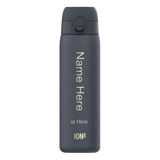 A dark gray water bottle stands upright against a plain background with text “Name Here or Here ION8” vertically printed on its side